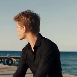 Replaces the man in black in the original Raindance AI clip